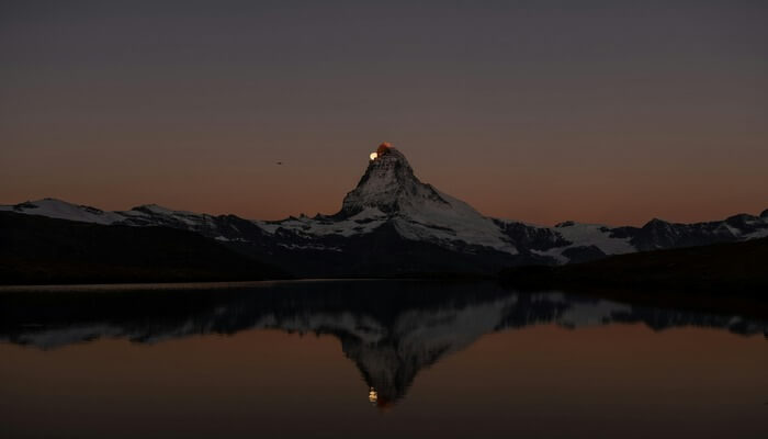 Zermatt Matterhorn with a reflection in Riffelsee Lake